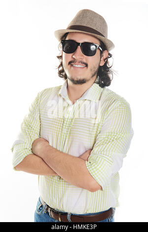 man in sunglasses and hat with crossed arms isolated on white Stock Photo