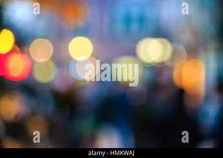 abstract background of blurred warm  and cool blue lights on city street  background with bokeh effect Stock Photo