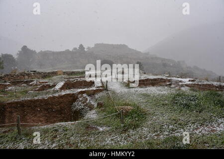 A general view over snow falling in the archaeological site of Mycenae, Greece, 07 January 2017. A cold wave across Greece causing temperatures to dro Stock Photo