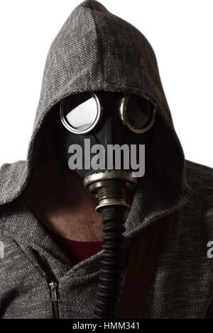 Scary man wearing authentic Russian gas mask with breathing hose Stock Photo