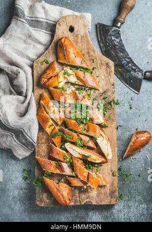 Turkish pizza pide with cheese and spinach chopped in slices Stock Photo