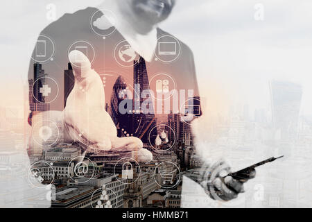 Double exposure of Designer hand pressing an imaginary button,holding smart phone,digital screen graphic virtual icons,channel,diagram,London architec Stock Photo