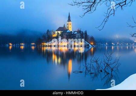 Foggy evening on Bled lake in Slovenia Stock Photo