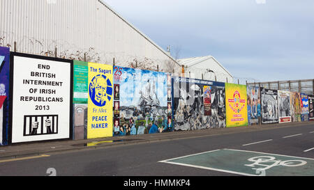 BELFAST, NORTHERN IRELAND - FEB 9, 2014: Political mural in Belfast, Northern Ireland. Falls Road is famous for its political murals.
