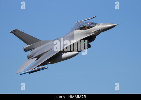 F-16 fighter jet making a fast and low flyby Stock Photo