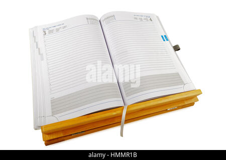 open notebook on wooden rack, isolated, studio shot Stock Photo