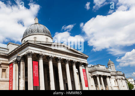 LONDON - AUGUST 20: The National Gallery at Trafalgar Square in London with blue sky on August 20, 2013 Stock Photo