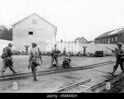 DACHAU CONCENTRATION CAMP -  US Army photo purporting to show the execution of SS guards in the coal yard area on 29 April 1945. Stock Photo