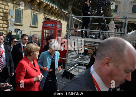 Valletta, Malta. 3rd February, 2017. German Chancellor Angela Merkel (Left) and British Prime Minister Theresa May (Right) at a summit of the European Council in Valletta, Malta, Friday, Feb. 3, 2017. A continued flow of migrants from the Middle East and Africa is pressuring the European Council to act with some calling for cooperation with the Libyan government to stem the flow of migrants along the central Mediterranean route. Credit: Kendall Gilbert/Alamy Live News Stock Photo