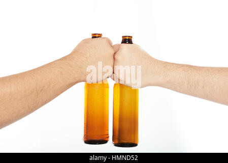 close up of cheering guys with beer bottle isolated on white Stock Photo