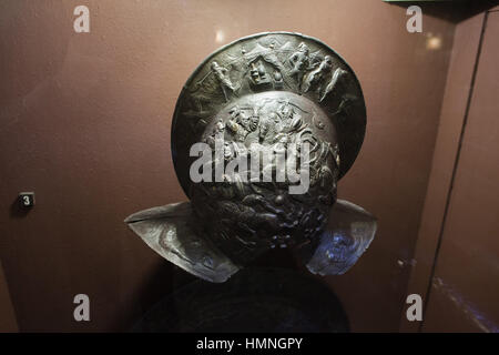 Morion open helmet with comb (crest) of Polish Grand Crown Hetman Jan Tarnowski, 16th century exhibit with engravings in Polish Army Museum in Warsaw, Stock Photo