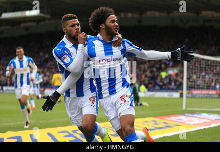 Huddersfield Town's Isaiah Brown (right) celebrates scoring his side's first goal of the game with Elias Kachunga during the Sky Bet Championship match at the John Smith's Stadium, Huddersfield. Stock Photo