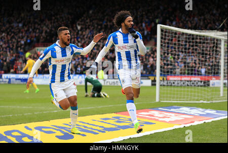 Huddersfield Town's Isaiah Brown (right) celebrates scoring his side's first goal of the game with Elias Kachunga during the Sky Bet Championship match at the John Smith's Stadium, Huddersfield. Stock Photo