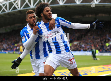 Huddersfield Town's Isaiah Brown (right) celebrates scoring his side's first goal of the game with Elias Kachunga during the Sky Bet Championship match at the John Smith's Stadium, Huddersfield. Stock Photo