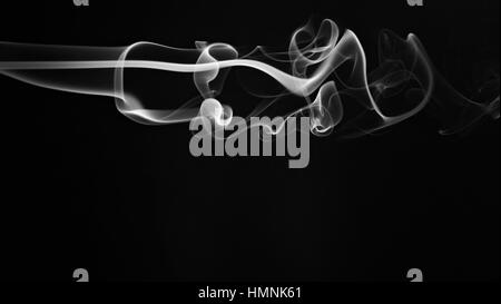 abstract white smoke lines isolated on black Stock Photo