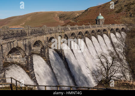 Dams at the Elan Valley overflowing after winter rains, Rhayader, Powys, Wales. Stock Photo