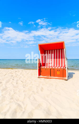 Wicker chair on Jurata beach on sunny summer day, Hel peninsula, Baltic Sea, Poland Stock Photo