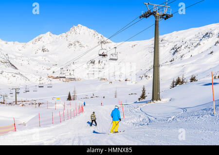 View of chairlifts and beautiful winter scenery in Obertauern ski resort, Austria Stock Photo