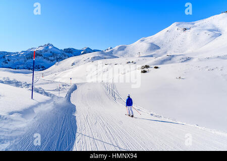 Skier on ski slope in Obertauern winter resort, Austria Stock Photo