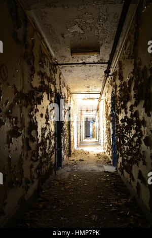 Dark Hallway in Abandoned Hospital Building Stock Photo