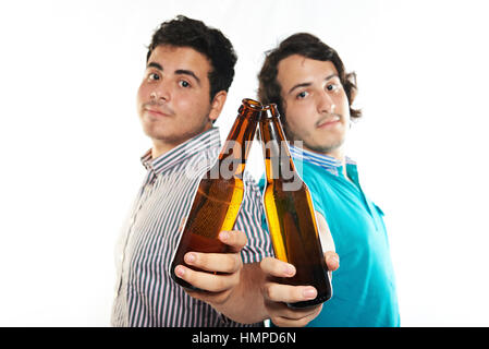 beer bottle in hands of friends isolated on white Stock Photo