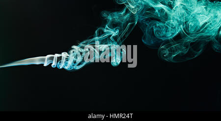 green cloud of smoke of black isolated background. Background from