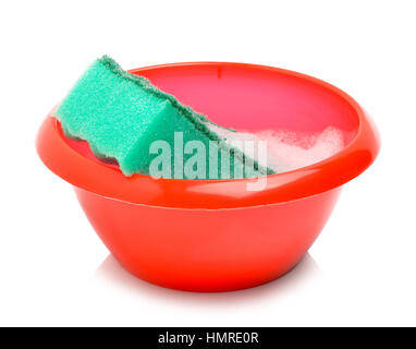 Red bowl and green sponge with foam isolated on white Stock Photo