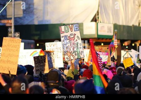 New York, USA. 4th February, 2017. Demonstrators at the LGBTQ Solidary rally in front of the Stonewall Inn against executive orders issued by President Trump banning people from seven Muslim-majority countries from entering the U.S. People want to show support for those most affected by recent policies enacted by Donald Trump. February 4, 2017 Stock Photo