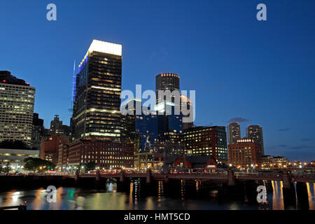 Evening view of Boston Harbor and the financial district of downtown Boston, Massachusetts, United States. Stock Photo