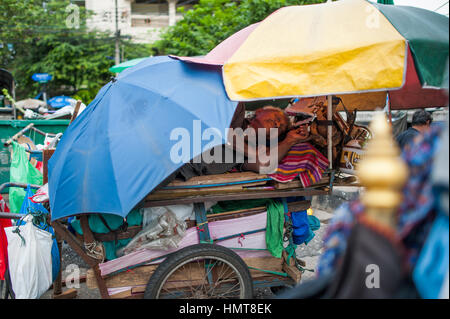 homeless sleeping in the street Stock Photo