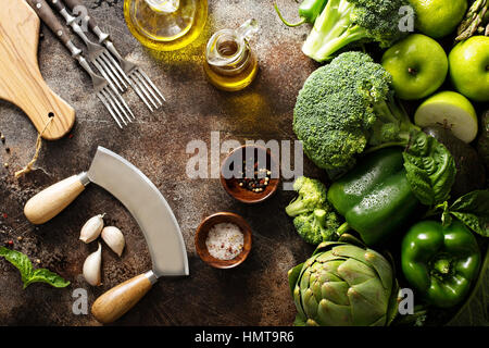Variety of green vegetables and fruits copyspace on dark table Stock Photo
