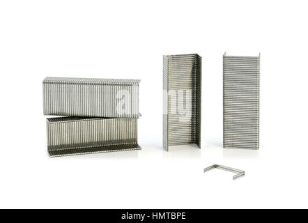 Stack of metal staples on a white background Stock Photo