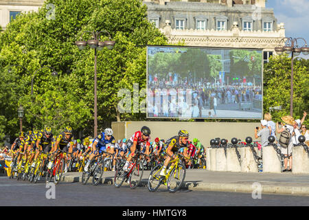 Paris, France - July 24, 2016: Thomas Voeckler of Direct Energie Team and Thomas De Gendt of Lotto-Soudal Team in fornt of the peloton passing by the  Stock Photo