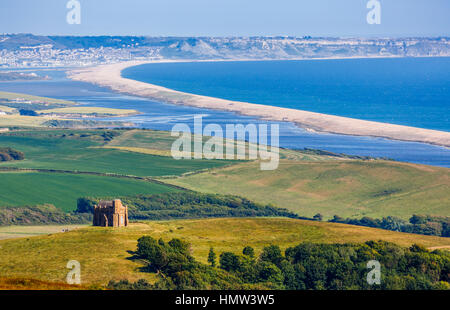 Panoramic view of Chesil Beach towards Weymouth and the Isle of Portland on the coast of Dorset in south-west England in summer with a clear blue sky Stock Photo