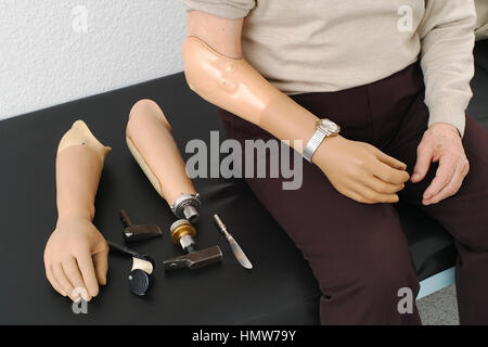 Disabled veteran with various prosthetic arms, myoelectric forearm prosthesis, for various activities, Germany Stock Photo