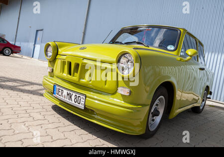 ALTENTREPTOW / GERMANY - MAY 1, 2015: german tuned trabant car stands near a hall at oldtimer show on may 1, 2015 in altentreptow, germany. Stock Photo