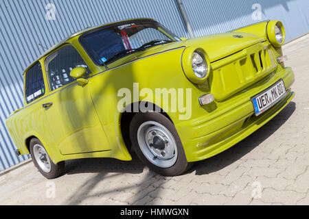 ALTENTREPTOW / GERMANY - MAY 1, 2015: german tuned trabant car stands near a hall at oldtimer show on may 1, 2015 in altentreptow, germany. Stock Photo