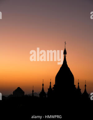 Sunrise in Bagan, Myanmar. Myanmar is also known formally as Burma. Hot Air Balloons are present if the weather is good. Stock Photo