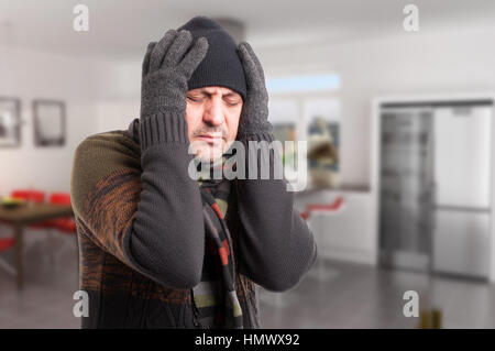 Man suffering from influenza and headache as migraine concept with advertising area Stock Photo