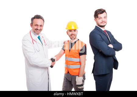 Businessman near medic and engineer offering handshake as welcome or agreement concept on white background Stock Photo