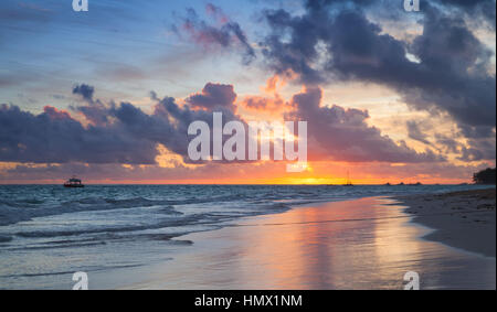 Colorful sunrise over Atlantic Ocean coast, Bavaro beach, Hispaniola Island. Dominican Republic, coastal landscape Stock Photo