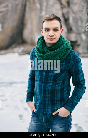 The guy in the checkered shirt in the mountains Stock Photo