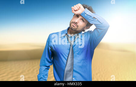 Sweating businessman due to hot climate Stock Photo