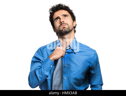 Sweating businessman due to hot climate Stock Photo