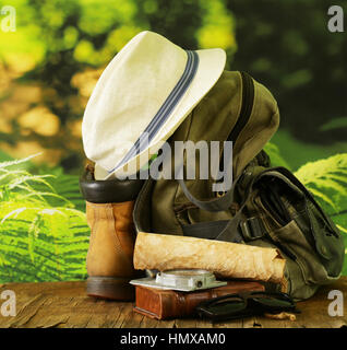 travel concept - backpack, compass, map and accessories Stock Photo