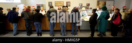 Davenport, Iowa, USA. 16th Dec, 2016. Volunteers at King's Harvest serve the noon meal to dozens of people at the shelter and meal site on West 3rd Street in Davenport Friday, December 16, 2016. Credit: Kevin E. Schmidt/Quad-City Times/ZUMA Wire/Alamy Live News Stock Photo