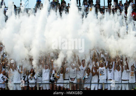 Bettendorf, Iowa, USA. 2nd Sep, 2016. Bettendorf High School students throw baby powder into the air as the team takes the field, Friday, September 2, 2016, against Assumption at TouVelle Stadium in Bettendorf. Credit: John Schultz/Quad-City Times/ZUMA Wire/Alamy Live News Stock Photo