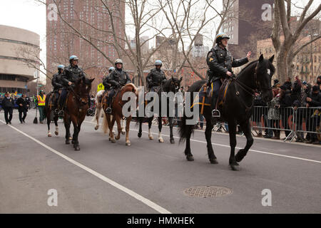 New York, USA. 5th February, 2017. Mounted police participate in the Chinese New Year Parade in NYC's Chinatown. Wanda Lotus/Alamy Live News Stock Photo