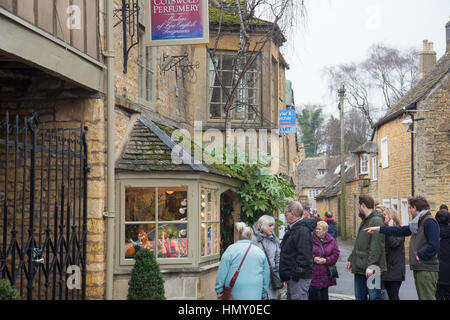 Bourton on the Water popular Cotswolds Village with a local perfumery store pictured,Gloucestershire, England,2017 Stock Photo