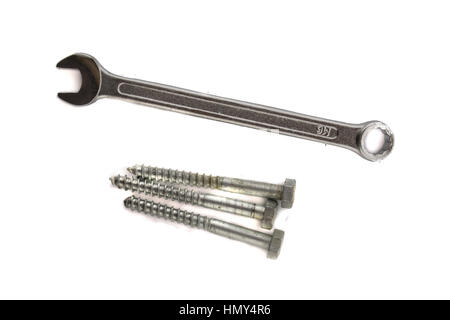 Hex wrench and screws on the white background Stock Photo